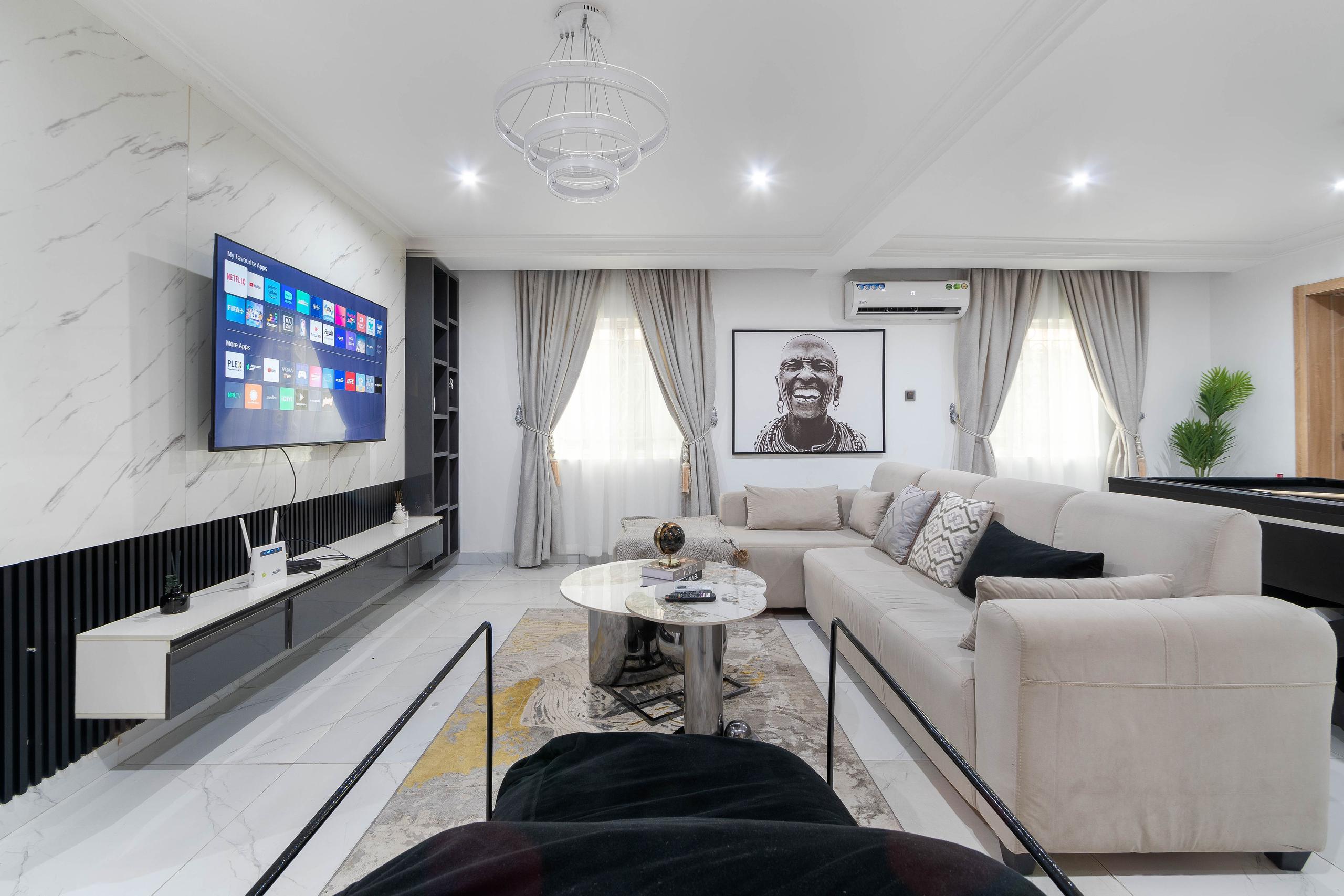 Living Room with Cream Sectional and Black Accents