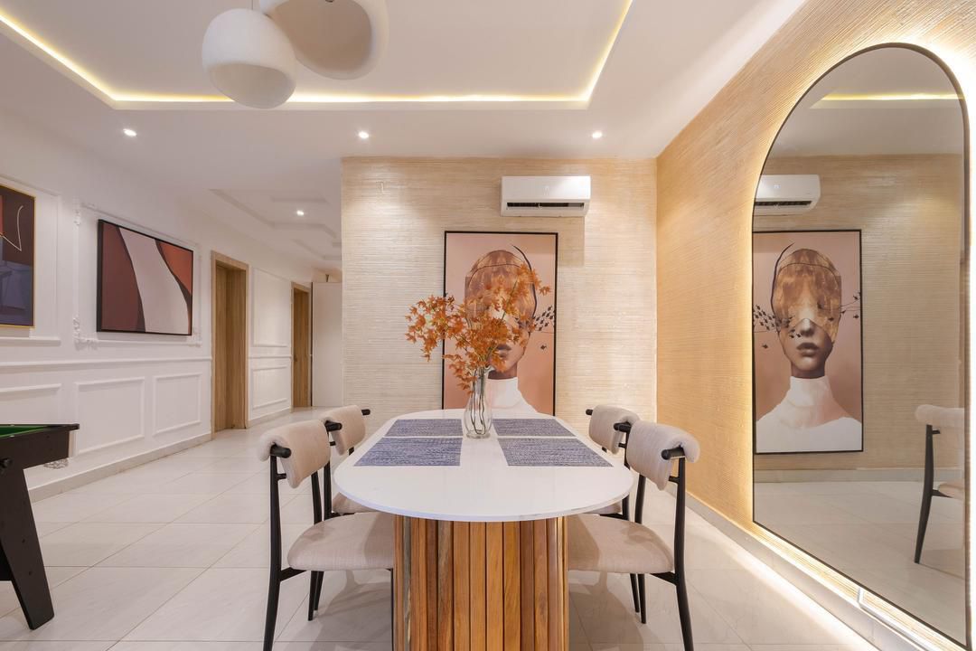 Dining Area with Abstract Portraiture