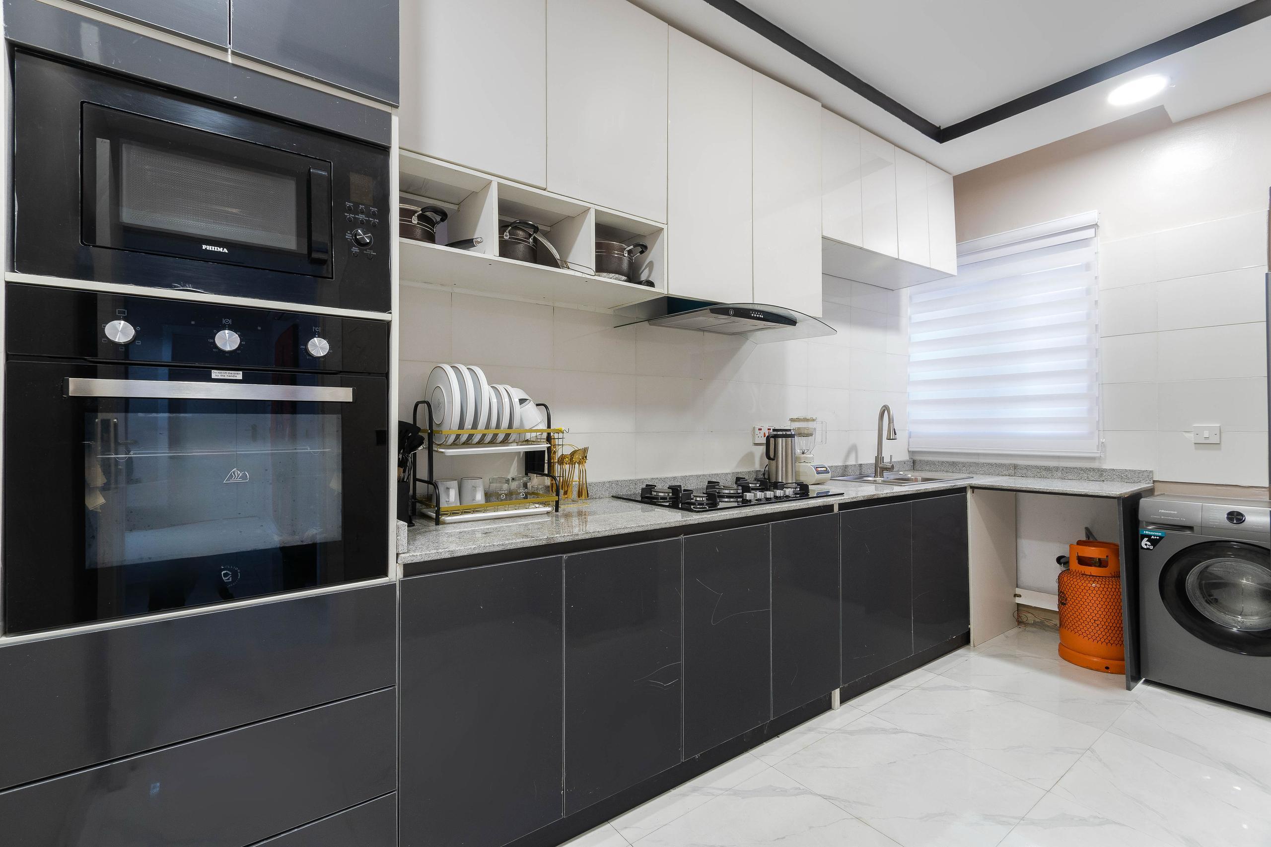 Tuxedo Kitchen with Charcoal and White Cabinetry