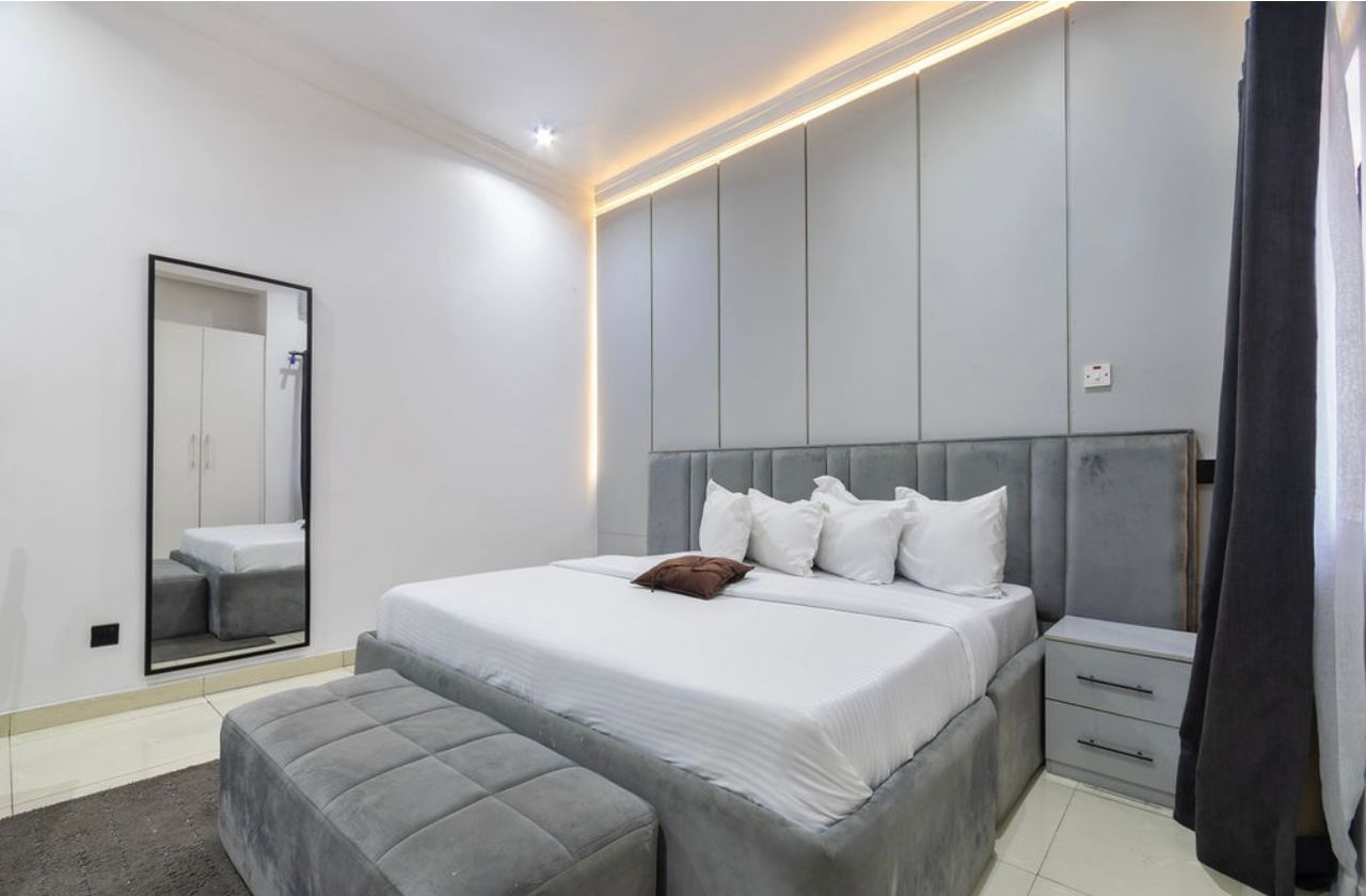 Master Bedroom with Dove-Gray Vertical Paneling