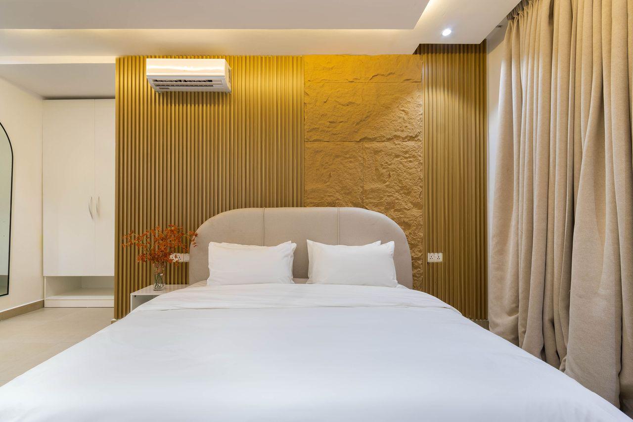 Master Bedroom with Gold Ochre Fluted Wall