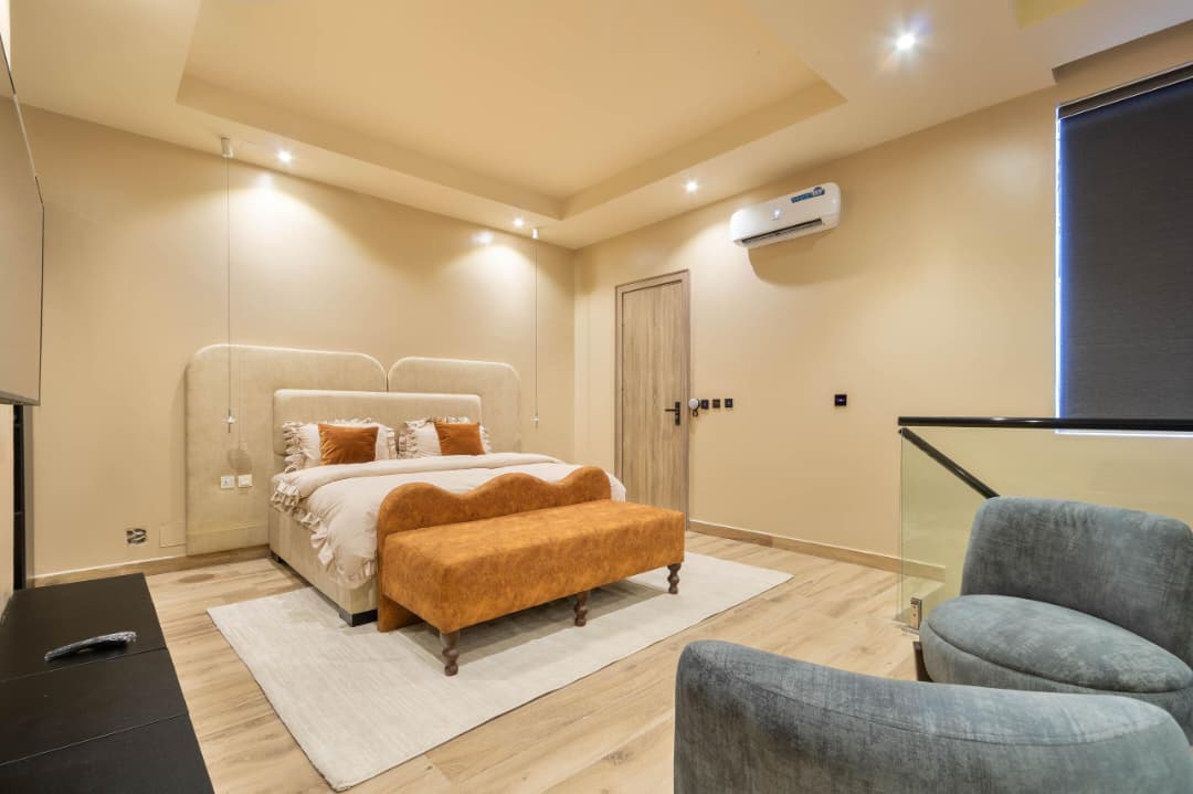 Loft Bedroom with Scalloped Headboard