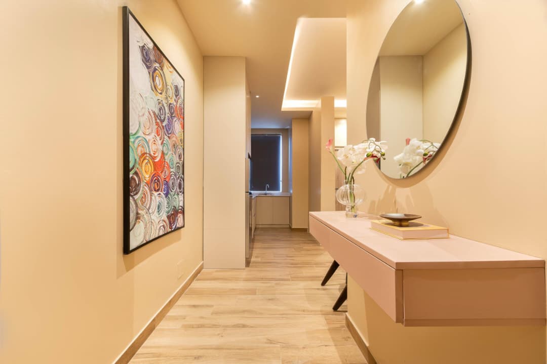 Hallway with Abstract Canvas and Round Mirror